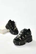 mens gothic platform shoes pair studio shot