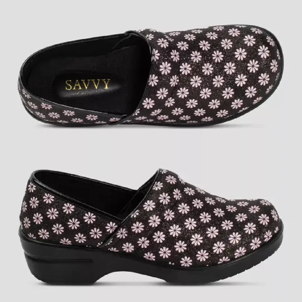 Pair of Savysells Women's Brandy Pink Daisy Nursing Clogs displaying top-down and side profile views.