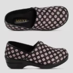 Pair of Savysells Women's Brandy Pink Daisy Nursing Clogs displaying top-down and side profile views.