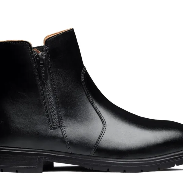 Side view of a black full-grain leather ladies steel toe boot highlighting the convenient side zipper closure.