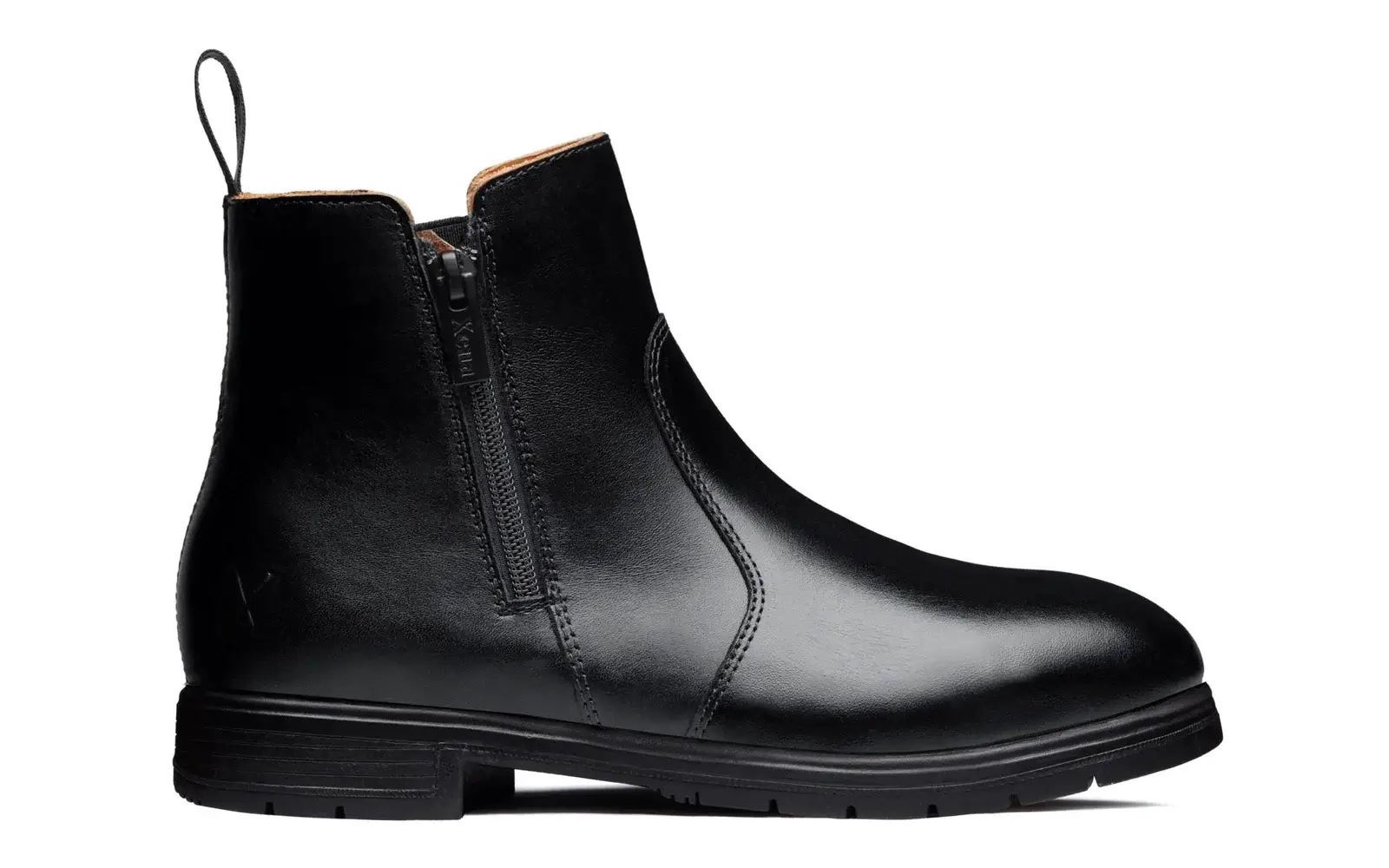 steel toe shoes ladies side zipper detail studio view Side view of a black full-grain leather ladies steel toe boot highlighting the convenient side zipper closure.