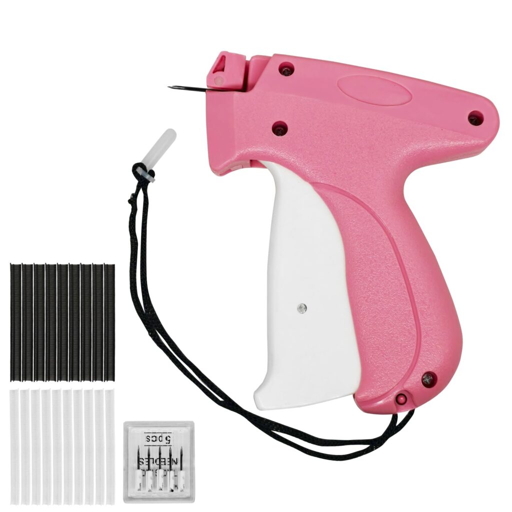 Pink handheld stitch gun for clothes with 2,000 black and white micro fasteners and 5 stainless steel needles